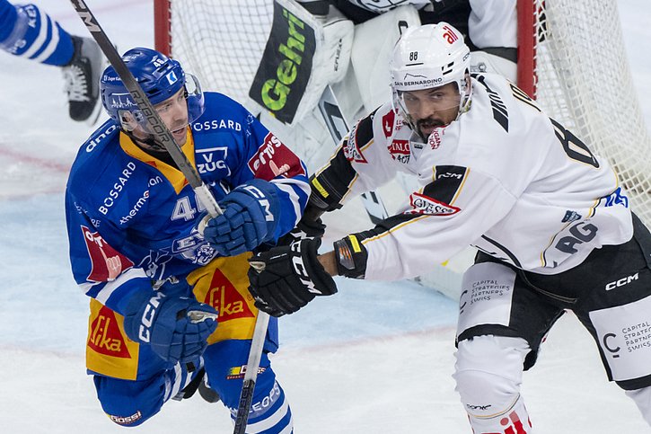 Martschini (à gauche) et Zoug ont battu Lugano mardi © KEYSTONE/URS FLUEELER